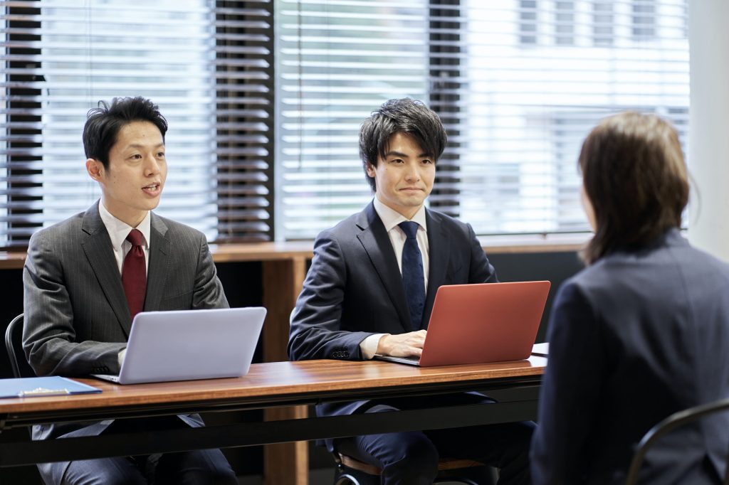 Asian woman interviewed in the office
